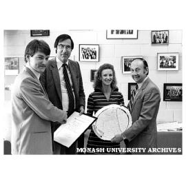 Mr Michael Taylor (left) receiving the George Papasavvas Memorial Trophy with Mr Peter Chandler (Head Marketing Department), Mrs Papasavvas and Mr Mike Collins