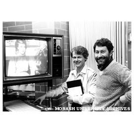 Mr Joe Dora (Education lecturer) and Mr Alan Harrison (Frankston Counselling Service Co-ordinator] viewing teacher training videos