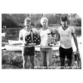 Sean Davis, Andrew Plaill and Brad Little, Civil Engineering students and concrete canoe makers with trophies at Lake Wendouree