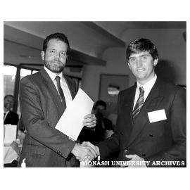 Hans de Zwart (left) receiving the Response Resource marketing award from John Dayman