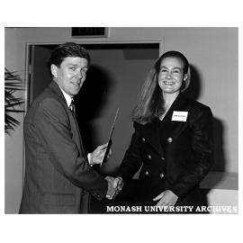 Sophie Malcolmson receiving the AANA marketing award from Robert Belleville