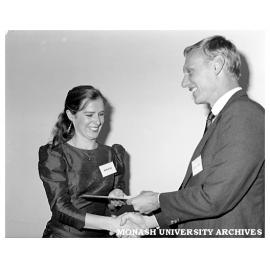 Michael O'Keefe presenting the Market Research Society Award to Janine Hellard