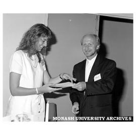 Melissa Jenkin receiving the Sussan Corp Award from Howard Jones