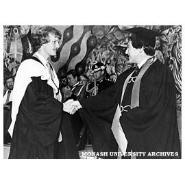 David Porritt (left) receiving Bachelor of Pharmacy from Thomas Lynden-Bell, President, Victorian College of Pharmacy