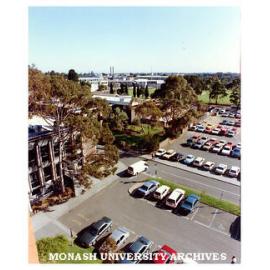 Raised view of University Offices and car park with Vera Moore garden