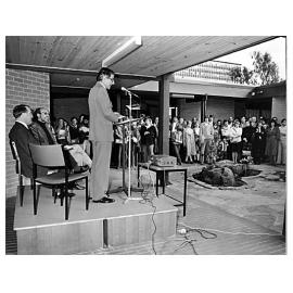 Vice-Chancellor Professor Ray Martin opening the Monash Arts and Crafts Centre. Warden of the Union Graeme Sweeney and Activities officer Graham Dean on dais.