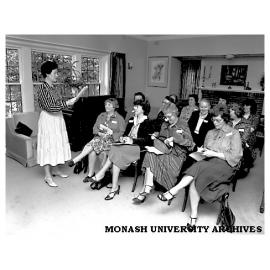 Mrs Rena Martin (left) with representative of volunteer groups at the end-of-year meeting at the Vice-Chancellor's House