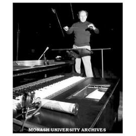 John Hopkins, Melbourne Symphony Orchestra conductor and a Duo Art Vorsetzer robot used to play and record Percy Grainger's pianola rolls with the orchestra