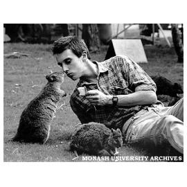 Wallaby keeper Mr Antony Taggart feeding quokkas