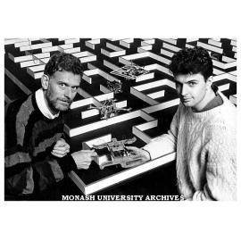 Lecturer Dr Simon Hill (left)and third year digital technology student Mr Brendan Simon with a maze and electro mechanic robotic mice