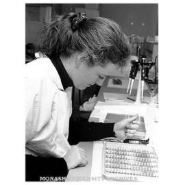 Ms Anna Butt, scientist at Prince Henry's Institute of Medical Research, performs an assay to examine endothelin production