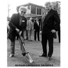 Vice-Chancellor Professor Mal Logan watches as Councillor Veronika Martens, Mayor of Caulfield, breaks ground for the General Teaching and Business School development on the Caulfield campus
