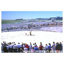 Binishell construction watched by spectators