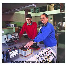 Gippsland technical officer Hermann Kohler and engineering student demonstrate motor speed control machine