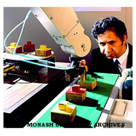 Gippsland engineering senior lecturer Ibrahim Yousef with robotic arm