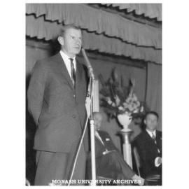 J. L. Keppert (assistant Chief Inspector of Technical School) speaking at the opening of the Commonwealth Technical Training Week exhibition at Chadstone shopping centre.