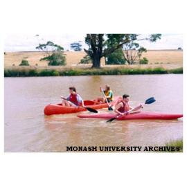 Students canoeing on Gippsland campus lake