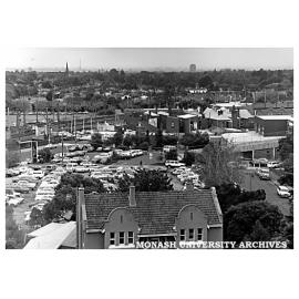Parking area at Chisholm's Caulfield campus, showing part of Caulfield Plaza and railway