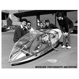 Chisholm electrical and mechanical engineering students and the electric powered vehicle they designed. Students (left to right) Maher Kharoufeh, Patrick Grandsable, Oliver Susie, Bassam Hanna, John Papansasiou and driver Andrew Edney