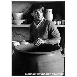 Chisholm Ceramic Design student Martin Gill with one of 12 giant ceramic planters he made on commission