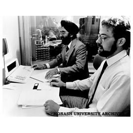 Chisholm Institute students Darshan Gill and Peter Kreuger using the 'Freaudit' microcomputer accounting package