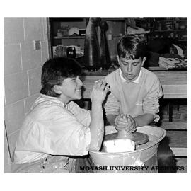 Trying out the pottery wheel at Chisholm Institute Open Day