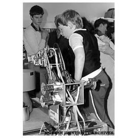 Young visitor to the Robotics laboratory on Chisholm Institute Open Day
