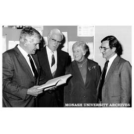 Honorary Bibliographer to the University Mr Ian McLaren (second from left) awarded a Master of Arts for his bibliographies. He is pictured with his wife Eileen, Chisholm Director Dr Geoff Vaughan (left) and Brian McFarlane