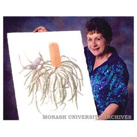 Botanic artist Celia Rosser with a banksia watercolour
