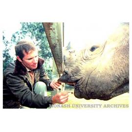 Postgraduate researcher Mr Andrew Thorne collects saliva from a black rhinoceros for the Monash University Animal Gene Storage Resources Centre