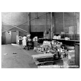 Early library accommodation in Volkswagon factory, Princes Highway