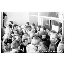 Student protesters confront Vice-Chancellor Matheson in Administration building.