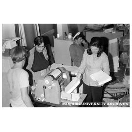 Students printing leaflets