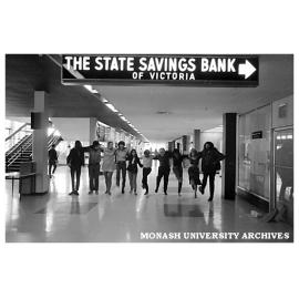 Students posing for Sate Savings Bank advertisement in the Orientation Handbook
