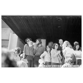Mr Johnson (Comptroller) and Vice-Chancellor Matheson (obscured rear right) with protesting students on steps of Administration building