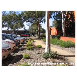 Garden beds and path beside Robert Blackwood Hall