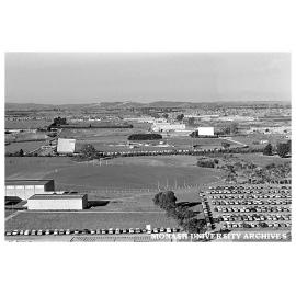Monash Sports Centre and playing fields with drive-in in background