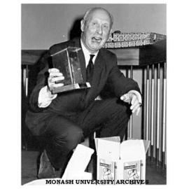 Buildings Officer G. P. H. Boycott (George), receives a tin dunny on his retirement.