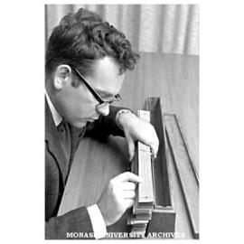 Dr. Lode Brakel with Indonesian book of leaves