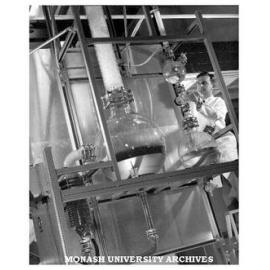 Researcher with scientific apparatus