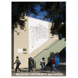 Sun dial on wall of Clayton Campus Centre