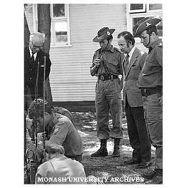 Vice-Chancellor Matheson (left), Lt. Col. Lockwood, Pro Vice-Chancellor Scott and Lt. Tucker watching a signals lesson at Monash University Regiment Camp, Benalla