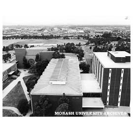 Raised view of Main Library and Robert Blackwood Hall with playing fields in the background