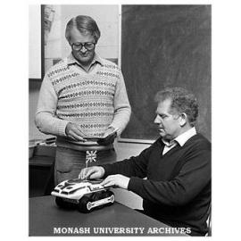 Dr John Theobald (left) and Dr Dudley Blane with tank shaped computed designed to makes mathematics fun for students.