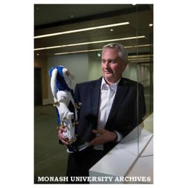 Professor Bill Charman, Dean of Pharmacy and Pharmaceutical Sciences, with keepsake from Basel, Switzerland.