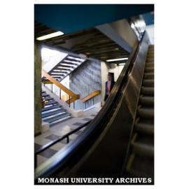 Interior of Menzies building showing escalators and stairs