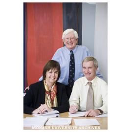 Signing a Memorandum of Understanding between Monash and Melbourne University, to establish UniWater - Professors John Lovering, Uniwater(standing), Edwina Cornish, and John McKenzie (University of Melbourne)