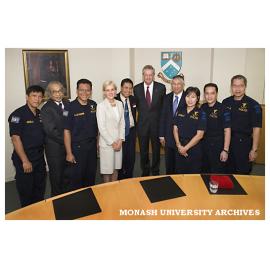 Vice-Chancellor Professor Richard Larkins (centre) with visiting Indonesian disaster victim identification team at a Clayton campus ceremony