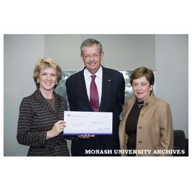 Senator Kaye Patterson (left) and Federal Education and Training Minister Julie Bishop visiting Monash with a cheque for $4.5 million from the Capital Development Pool fund with Vice-Chancellor Professor Richard Larkins