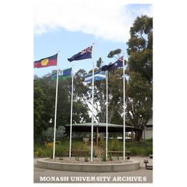 Flags at entrance to Peninsula campus